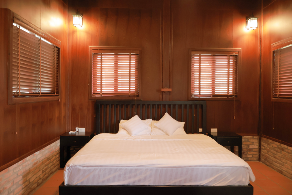 Wooden bungalow with double bed
