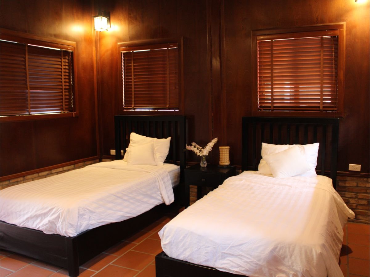 Wooden bungalow with twin beds